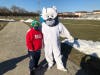Special Olympian Parker Bouda, 11, and the Chicago Polar Plunge bear at Marist High School's virtual plunge through a Polar Cannon. 