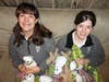 Sarah Dynia (left) and her friend, Bridget Regan, in 2012, then McAuley freshmen, pose with their Stuffed Love creations.  