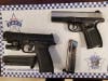 Two guns were found in a car during the early morning hours of April 11, where two men were found asleep with the engine running. 