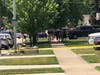 A block of 85th Street immediately off of Narragansett Avenue is blocked off after a vehicle plowed into a home early Monday afternoon. 