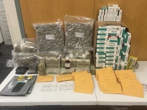 Chicago Ridge police netted over seven pounds of cannabis, hundreds of pills, unstamped cigarettes and $129,000 cash in June 28 traffic stop. 