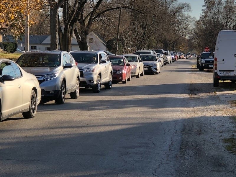 Cars line up for Worth Township's emergency food drop in November 2020. Residents can visit the township food pantry. 