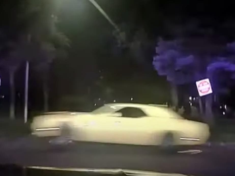 The driver of a yellow Dodge Challenger fleeing a melee in Oak Lawn Metra Parking Tower at 100mph has turned himself in, police said.  