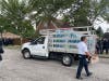 Chicago fire officials passed out bottled water to mourners outside of St. Rita of Cascia Shrine during the funeral for CPD Officer Ella French. Pallets of water were donated by Home Depot.