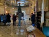 Protestors gather in the Illinois State Capitol Dome to protest a holiday display by The Satanic Temple. 