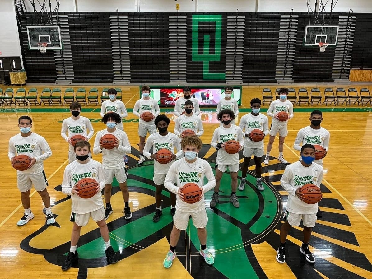Oak Lawn Community High School boys basketball team wins first South Suburban Conference Red title in 39 years.