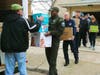 St. Bernadette parishioners, Evergreen Park Fire Department and community volunteers  load 600 boxes of medical and survival items into a 25-ft. moving truck.