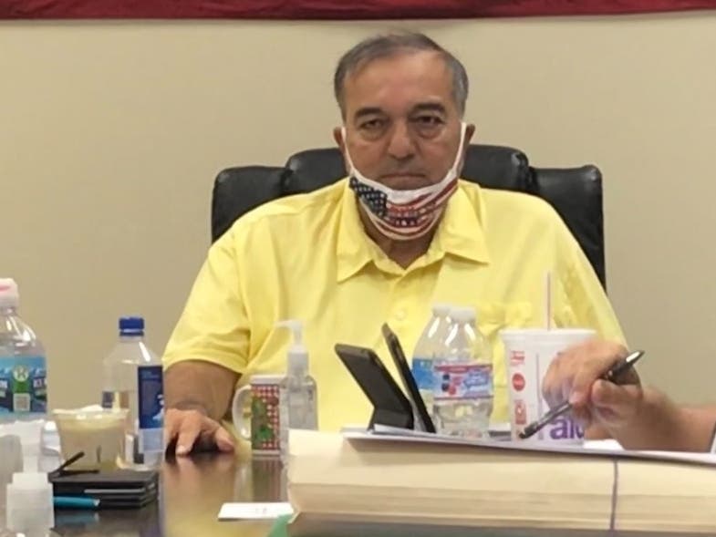 Then-Crestwood Mayor Lou Presta presides over a village board member in 2020 days after he was indicted on federal corruption charges. 