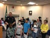 Oak Lawn Police Chief Dan Vittorio with the winners of the Oak Lawn Chamber's Fire and Public Safety Coloring Contest.