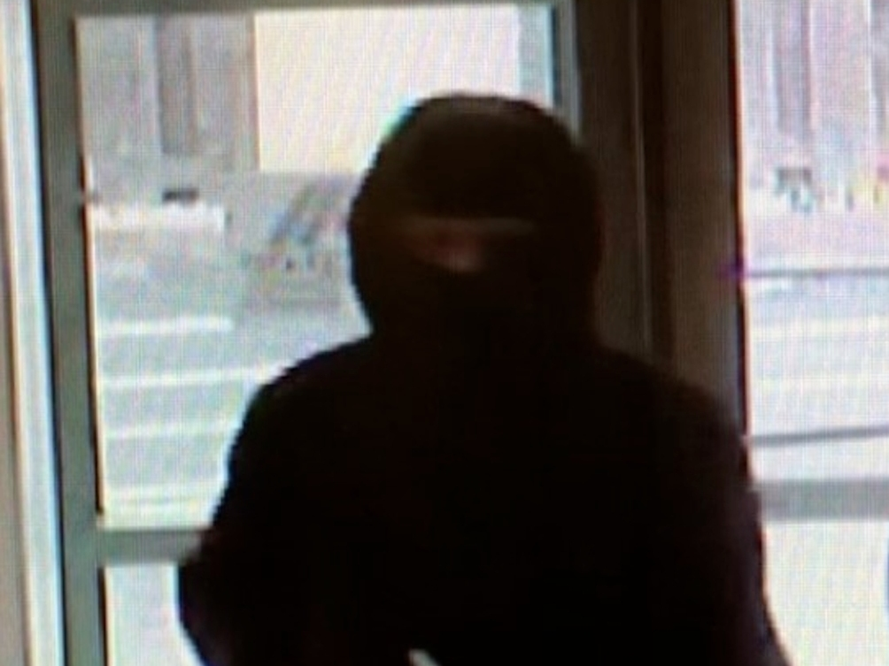 FBI asks for public's help in identifying a man they claim robbed the Scott Credit Union in Evergreen Park.