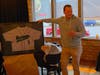 Chicago Cubs coach and former Mustang Jim Adduci slipped into Evergreen Park Community High School to retire old #1.