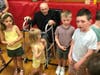 Fr. Albert Adamich celebrated his 100th birthday on May 15 with some young parishioners from Most Holy Redeemer.