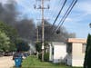 Smoke billows from a fire in an Oak Lawn mobile home park. 