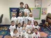 EPCHS juniors Jack Donnelly and Helen Joyce helped deliver future Mustang shirts to kindergartners at Southwest Elementary School. 