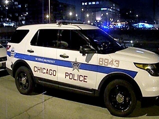 Chicago police shot a man Saturday evening in Roseland when he held a woman at knife point and stabbed an officer, CPD says.
