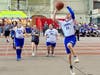 Shane Figura makes a jump shot for the Oak Lawn Eagles "B" team at the Special Olympics Illinois state basketball finals. 