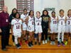 Coach Tom Drahozal with the historic 2022-2023 Morgan Park Academy varsity girls basketball team. 
