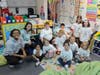 EPCHS students Neve Hayes and Kia Odom, alumni of Southwest School, distributed "Future Mustangs" to Southwest kindergarters.