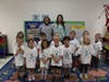 EPCHS students Neve Hayes and Kia Odom, alumni of Southwest School, distributed "Future Mustangs" to Southwest kindergarters.