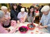 Sister Carol Mucha, RSM, Sister Anita Tallar, RSM, Ellie Gonzalez, Sister Jacquie Dewar, RSM, Natalie Pedroza and Sister Mary Ann Bergfeld, RSM, fill bags with candy to share
love with families served by Pat’s Pantry.