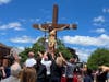 Parishioners place the statute of Christ from the St. Bernadette Church altar on the back of an Evergreen Park fire truck following the final relegation ceremony. 