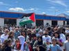 A victory parade and rally for Southsider Belal Muhammad, the first Palestinian to win a UFC championship, drew over 1,000 supporters in Bridgeview's Little Palestine. 