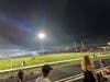 Smoke from the halftime fireworks show at Richards High School hangs over the football field as police clear out the visitors bleachers after several Oak Lawn cheerleaders were reportedly attacked.