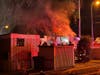 Oak Lawn firefighters battle a blaze early Monday morning in the Airway Mobile Home Community.