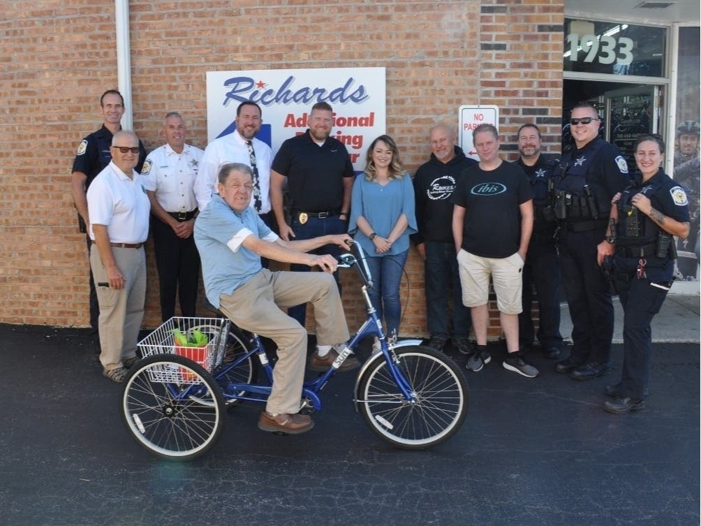 John Cronin, 65, on his brand new wheels that were donated to him by  11933 S. Harlem Ave., Palos Heights. Police chipped in on McDonald's gift cards for John. 