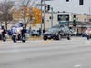 The hearse bearing the remains of CPD Officer Enrique Martinez makes its wat down 103rd Street to St. Rita. 