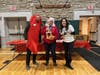 Stephen DeFalco, director of the Palos Park Recreation Department (dressed as a chili pepper) and Mayor Nicole Milevich-Walters (far right) present the trophy for best chili to CASI member Tracy Hoffman, of Adams, WI.