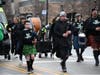 A young piper marches down Western Avenue on March 15 in the South Side Irish Parade. 