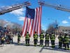 Chicago firefighters prepare for the dignified transfer of FF/EMT Michael Altman, who died of injuries he sustained fighting an apartment building fire in Rogers Park, from Stroger Hospital to the Cook County Medical Examiner's Office.