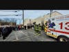 Chicago firefighters, family members and residents watch the arrival of CFD Firefighter Altman's remains arrival at Blake-Lamb Funeral Home. 