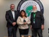 Dist. 229 Supt. Shahe Bagdasarian, Maria Vanderwarren and Dist. 229 Board President Robert Loehr. Vanderwarren was recognized with a Spartan Excellence Award. 