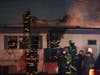 Oak Lawn firefighters battle a blaze at a mobile home in Airway Mobile Home Community.