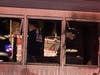 Oak Lawn firefighters search for hot spots after striking a mobile home fire in the Airway Mobile Home Community. 