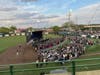 Trinity Christian College's last graduating class gathers for commencement exercises Friday at Ozinga Field in Crestwood. 