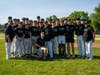 Oak Lawn Community High School baseball coach Bill Gerny and his varsity baseball team after the Spartans beat TF North for Gerny's 200th win. 