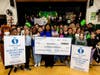Northwest Elementary School math teacher Shavon Brewer and her fifth-grade math class after she received a Golden Apple Excellence in Teaching Award. 