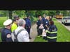 Ald. Raymond Lopez (yellow) joins Chicago Fire Department members in passing out smoke alarms and fire safety literature.