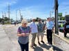 Residents check the Big Boy 4014 tracker on their cell phones, including Oak Lawn Mayor Terry Vorderer (in striped shirt).