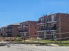Roofs were blown off apartment buildings in Roberts Park.
