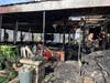 Many of the tables in the dining area were left unscathed by the fire early Monday morning at Mashawee Guy restaurant. 
