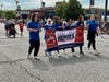 Hometown Heroes whose banners hang from light poles along 95th Street and Cicero Avenue and/or their families were invited to march in this year’s parade.