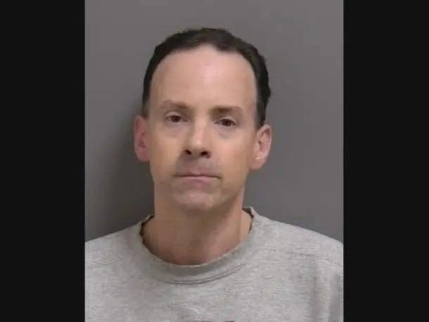 Former Catholic school substitute teacher Brett Smith, 43, pleads guilty to a lesser felony charge because the judge did not want to traumatize the child by making him testify.