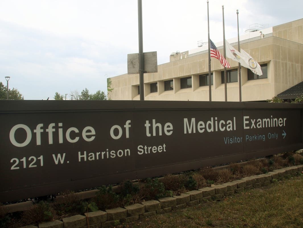 The Cook County Medical Examiner has ruled the deaths of two custodians found with gunshot wounds inside Mark Twain Elementary School to be murder-suicide.