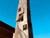 Embedded into the obelisks are likenesses of hands and faces police officers, firefighters, and civilians who came to the aid of strangers on Sept. 11, 2001. Some Oak Lawn residents served as models.