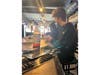 Erik Hornik prepares specialty coffee drinks at the Grove in Oak Lawn. CHSD 218's ATP for young adults with disabilities is currently seeking partners for job training.
