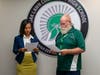 Oak Lawn Community High School Dist. 229 Board of Education president Rob Loehr swears  in Kelli Evans, was appointed to fill a board vacancy.